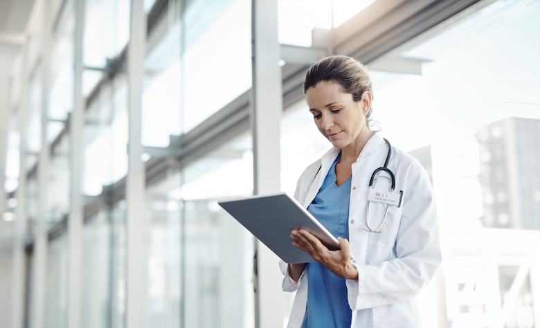 Doctor holding clipboard
